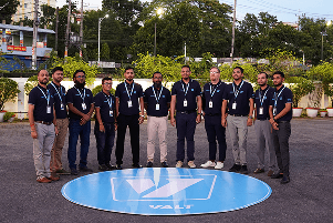 Team photo outside venue